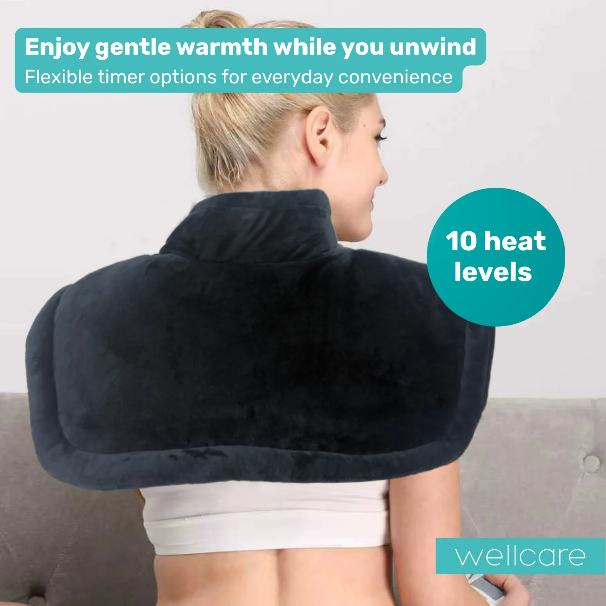 Wellcare Heating Pad HP05-001 electric heat therapy pad being used on the neck by woman